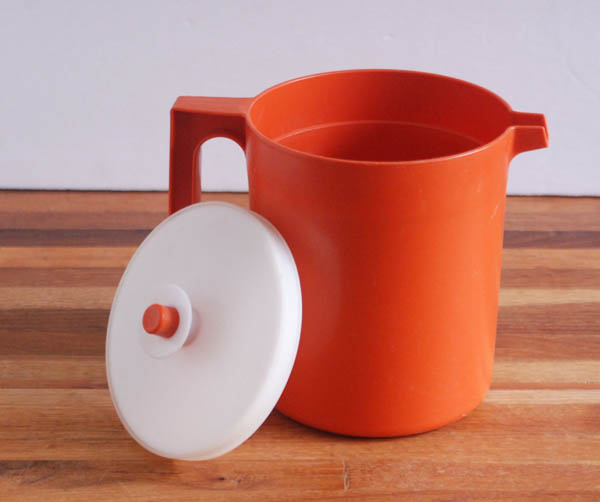 Orange Tupperware juice pitcher